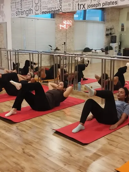 Various shots of our vibrant and engaging Mat Pilates group classes.