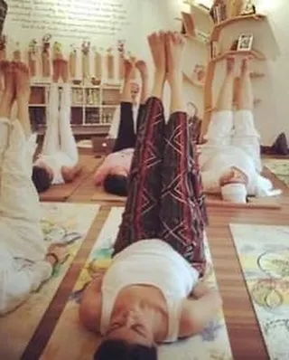 A moment from a past Winter Solstice workshop, showing participants in an inversion. These practices help us connect with the powerful pranic value of the solstices.