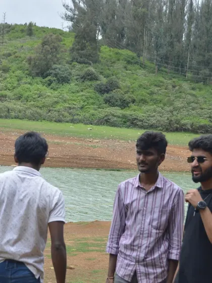 A duplicate of a candid moment of conversation by the lake on our first day. Getting to know each other is a key part of the journey.