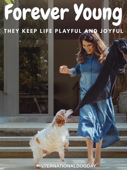 The playful energy between this woman and her dog is infectious! This candid shot captures the forever-young spirit that our pets bring into our lives, keeping every day joyful.