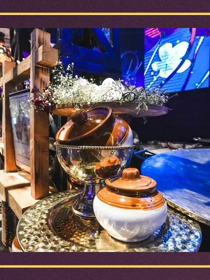 A display of traditional Indian pickles in classic ceramic 'barnis'. We love to incorporate authentic, rustic elements into our modern setups to tell a complete culinary story.