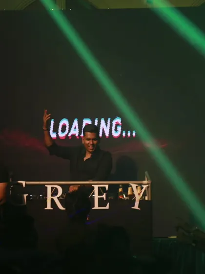 Waving to the crowd as my intro visuals play. The start of the set is all about building anticipation.