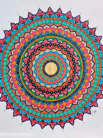 'Rainbow Riot', a 2x2 feet custom mandala that is an absolute explosion of color. This piece was a joy to create, with every ring bringing in a new, vibrant hue.