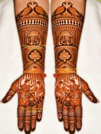This design shows a beautiful Varmala ceremony on the palms, with peacocks and elephants adorning the arms for a traditional look.