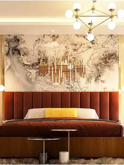A bedroom that blends rustic charm with modern luxury. The deep red upholstered headboard is set against a textured marble-effect wall, creating a rich and inviting space perfect for relaxation.
