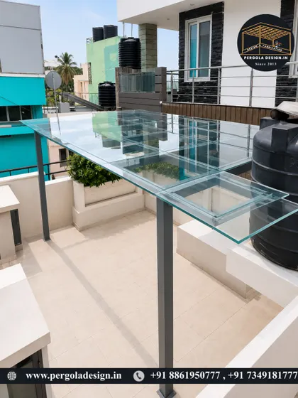 The final result of a sleek terrace transformation. This toughened glass pergola provides complete rain protection while keeping the space bright and open, showcasing a modern and minimalist aesthetic.