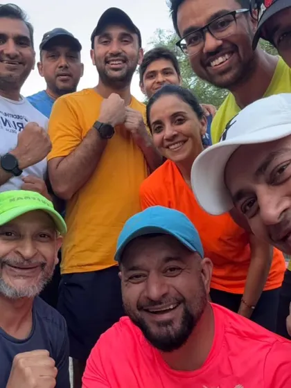 A happy group selfie after a run. The smiles say it all. We love what we do.