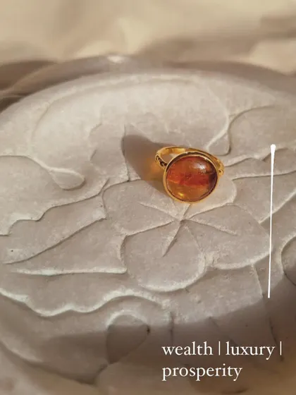 The Hessonite Garnet Sun Ring, a beautiful piece for manifesting wealth, luxury, and prosperity.