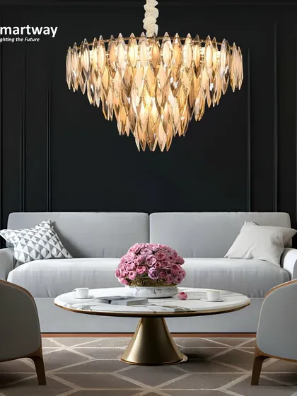 A beautiful leaf-inspired crystal chandelier, perfect for a living room or entryway. The warm light reflects off the crystals to create a sparkling, luxurious feel.