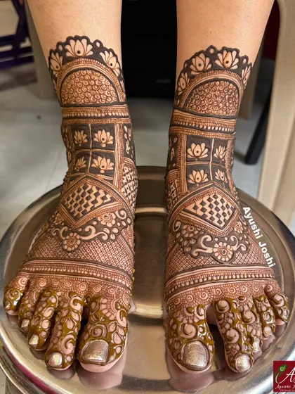 A very dense and full bridal feet design, perfect for the bride who wants complete coverage with traditional floral and architectural motifs.