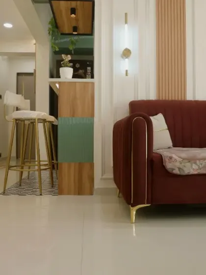 A glimpse from the living room towards the breakfast bar, showing how different spaces are connected through a cohesive design language.