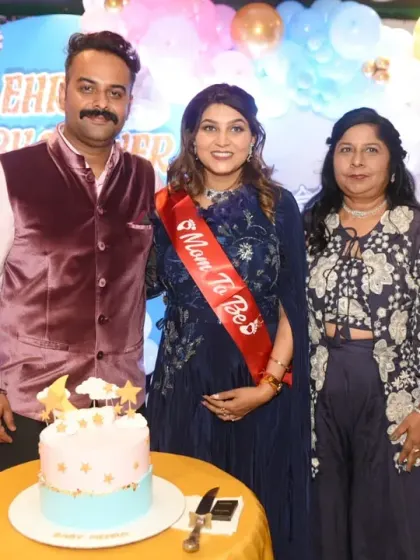 The happy couple with a family member at their baby shower. I take various group combinations to ensure everyone gets a special photo.