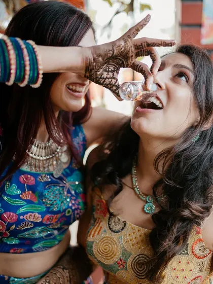 More fun and games at the Mehendi. It's all about creating a party atmosphere.