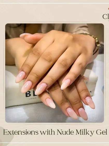 The classic milky nude shade is always a favorite. These extensions offer a clean, elegant look that is perfect for any occasion.