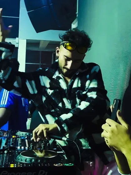 In the zone, feeling the music with the crowd. Whether it's a commercial hit or one of my own desi edits, I perform every track with passion. This is more than a job; it's my life.