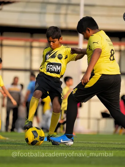 A player uses his strength to shield the ball from a bigger opponent. I teach tactical skills that allow players of all sizes to compete effectively.