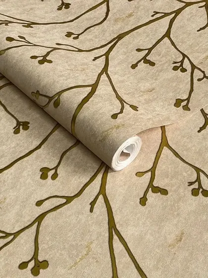 A close-up of a beige wallpaper roll with a subtle, textured branch pattern.