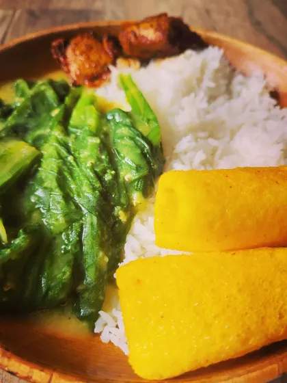 This angle highlights the yellow finger fryums, adding a fun and crunchy element to the meal.