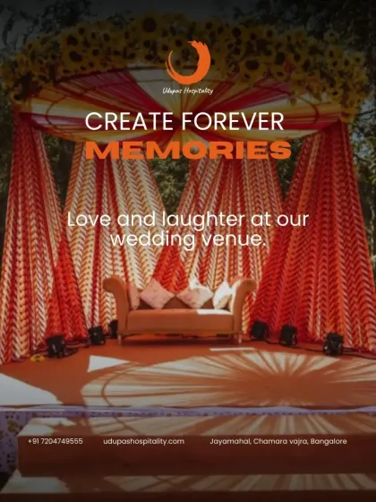 Create forever memories at our wedding venues. This image of a beautifully decorated mandap with vibrant orange and red drapes embodies the love and laughter we aim to facilitate at every wedding.