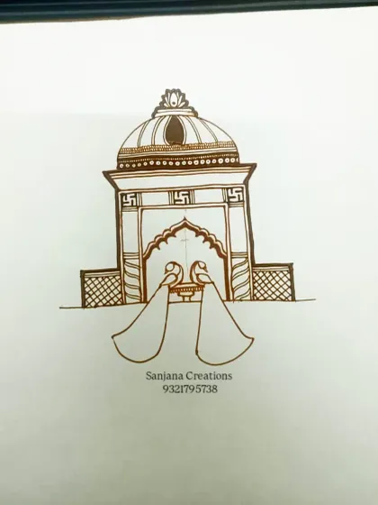The first step of a bridal startup design on paper. This shows the basic outline of the palace and peacock motif.