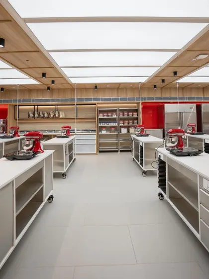 The full length of our well-stocked and organized kitchen.