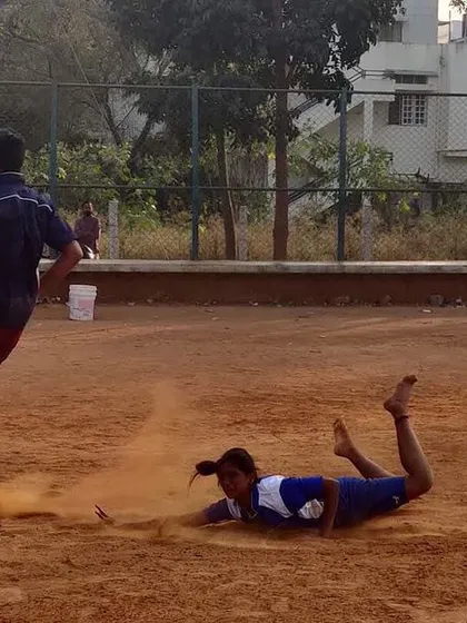 The perfect dive. This is the result of hours of practice, a player stretching his entire body to tag a defender just in time on our authentic dirt court.
