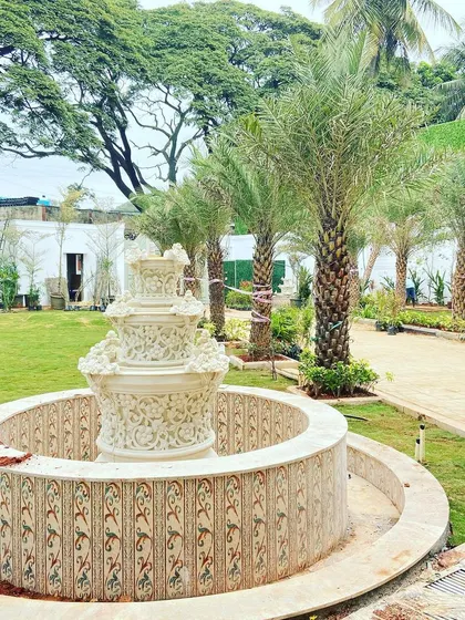 We installed this ornate, multi-tiered marble fountain as the centerpiece for a formal lawn, adding a touch of classical elegance to the landscape.
