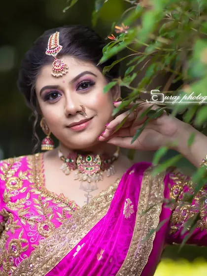 A soft, natural light portrait that highlights the delicate features of the model and the jewellery.
