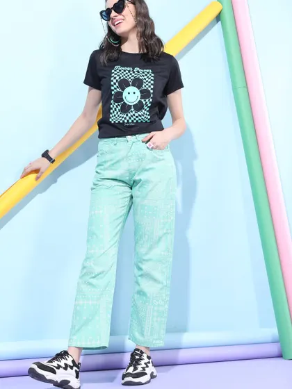 Another angle of the skater-girl look, showing how the cropped pants and sneakers work together for a comfortable yet stylish streetwear outfit.
