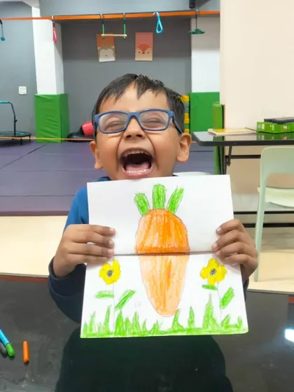 The pure excitement of finishing your artwork. This little ninja is thrilled with his pop-up bunny card, and his infectious joy is what my workshops are all about.