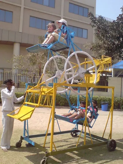 We also offer a 4-seater Ferris wheel, which is a great option for smaller spaces or events with younger children. It provides the same classic fun in a more compact footprint.
