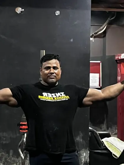 A quick pose to check the arm and shoulder development. Building a powerful upper body is key for a massive bench press.