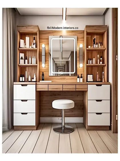 Getting ready should feel like a treat! This dressing table design has it all: a beautifully lit mirror, lots of drawers for makeup and accessories, and open shelves for your favorite perfumes. It’s a personal corner that’s both glamorous and perfectly organized.