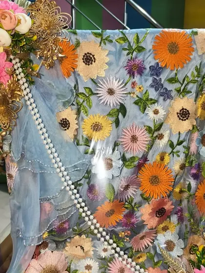Another angle of the floral suit, showing the full arrangement from the top. The packing is designed to be beautiful from all sides.