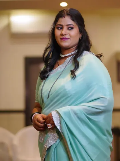 A candid shot of the guest, her makeup looking beautiful and radiant.