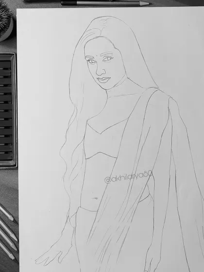 The initial outline sketch for my Shraddha Kapoor drawing. This shows the first step of my process, where I map out the composition and likeness.