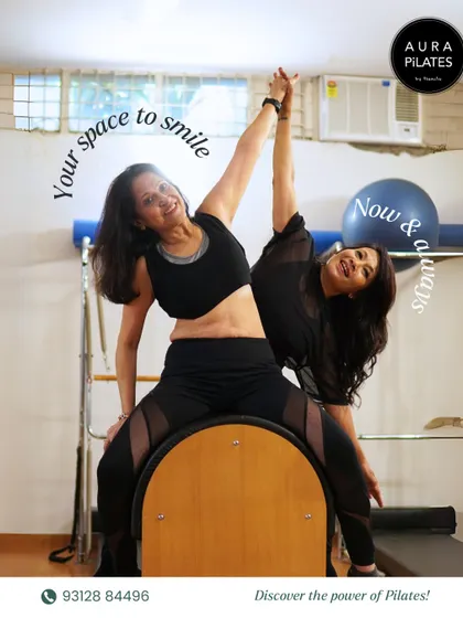This is your space to smile, now and always. We believe that fitness should bring you joy. Here I am sharing a happy moment with a client, because we love smiling through the stretch.