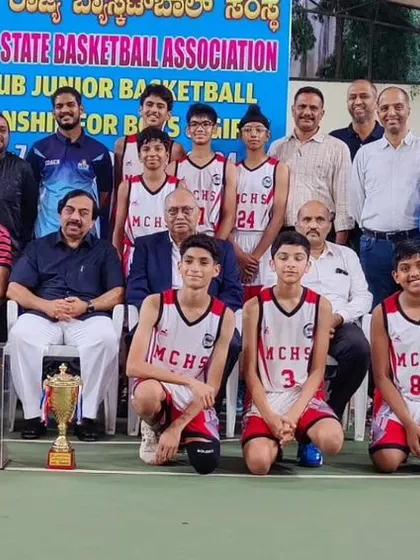 The official team photo of our U13 State Champions with the Karnataka State Basketball Association officials.