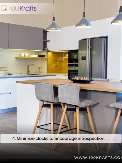 Mindful design is about choosing what truly matters. This image of a modern kitchen with an island encourages minimizing clocks to foster introspection and a sense of peace.