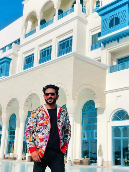 A fun, pop-art style jacket for a brunch event in Qatar. The colourful and quirky design is perfect for a relaxed yet stylish daytime celebration.