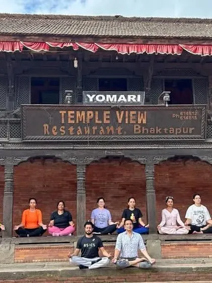 A moment of shared stillness. Our group meditates together in the historic city of Bhaktapur, Nepal.