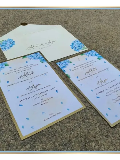 We designed this simple yet beautiful invitation featuring powder blue hydrangeas. The watercolor petals appear to float across the card, creating a light and airy feel for a spring or summer wedding.