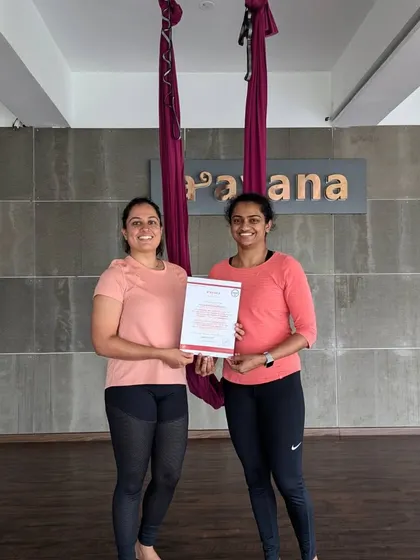 Two of our students, one an instructor and one a new graduate, share a moment of connection after the course completion.