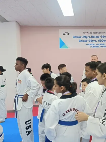 A diverse group of young athletes from different countries, including the USA, gathered at the World Expo.