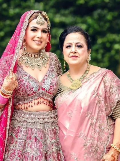 A lovely portrait of the bride and her mother. Our mehandi helps tie together the traditional looks for the entire family.