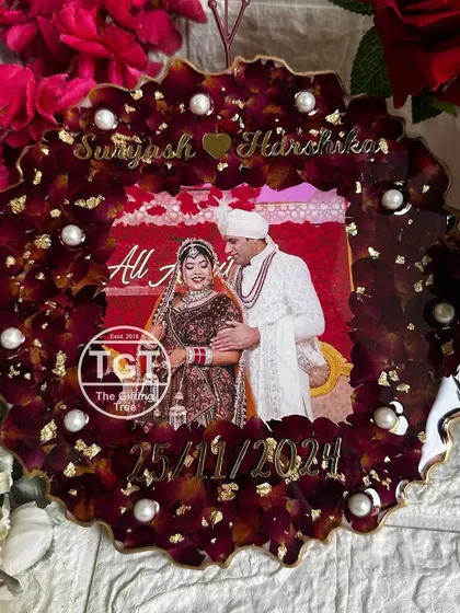 This view shows the beautiful texture created by the preserved rose petals. The pearls scattered throughout add points of light and elegance.