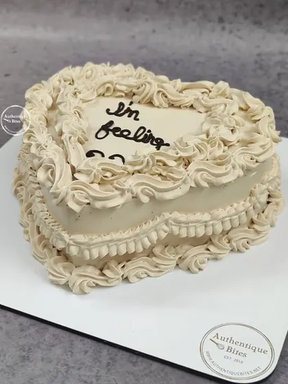 Inspired by Taylor Swift's song, this "I'm feeling 22" vintage heart cake has a delicious mocha flavor. The simple yet elegant piping is perfect for a fan's birthday.