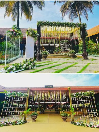 The entrance to the wedding venue, showcasing two different styles of floral and structural decoration.