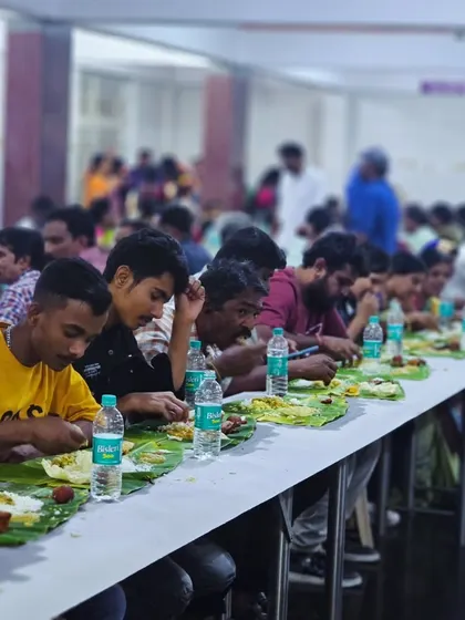Younger guests enjoying the traditional meal, showing its appeal across all age groups.
