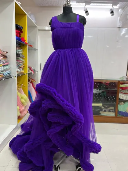 The purple red carpet gown on a mannequin in my studio.